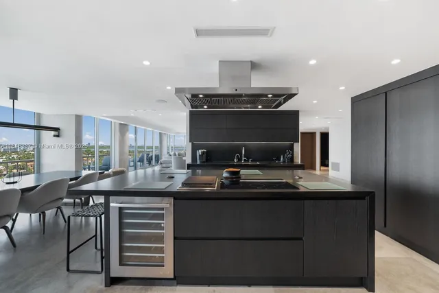 a kitchen with a sink and stove