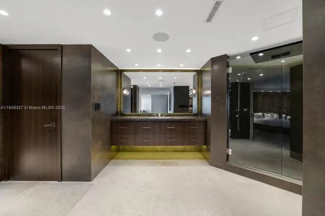 a view of a hallway with a living room