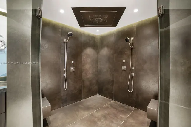 a bathroom with a shower and a toilet