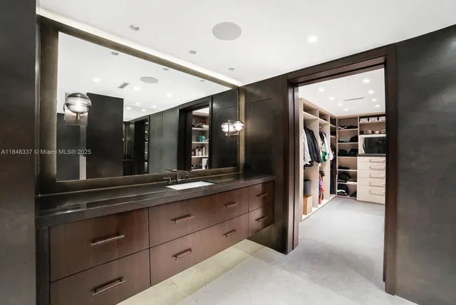 a view of living room with cabinets