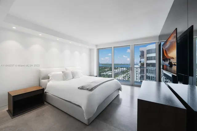 a spacious bathroom with a shower and a tub