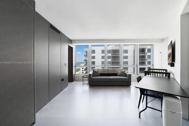 a view of a balcony with chairs