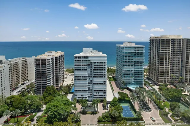 a view of a building with glass windows