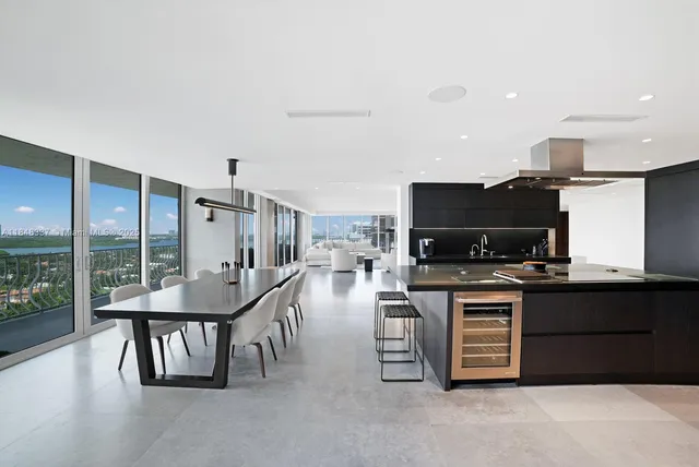 a kitchen with counter top space and appliances
