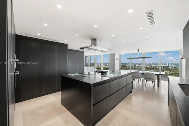 a very nice looking dining room with a large window