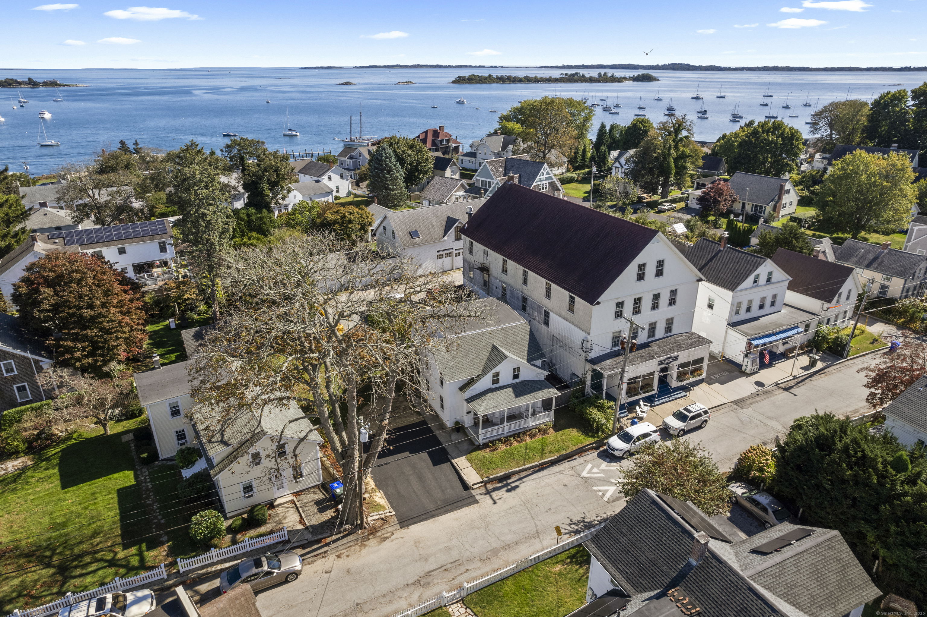 an aerial view of multiple house with outdoor space