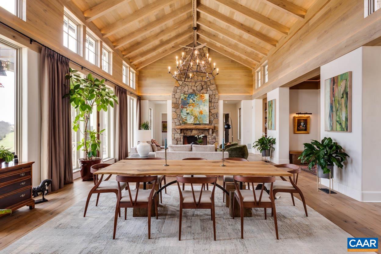 361 Union Mills Road Troy, VA 22974 - Photo 11 of 75 a dining room with furniture a chandelier and a rug