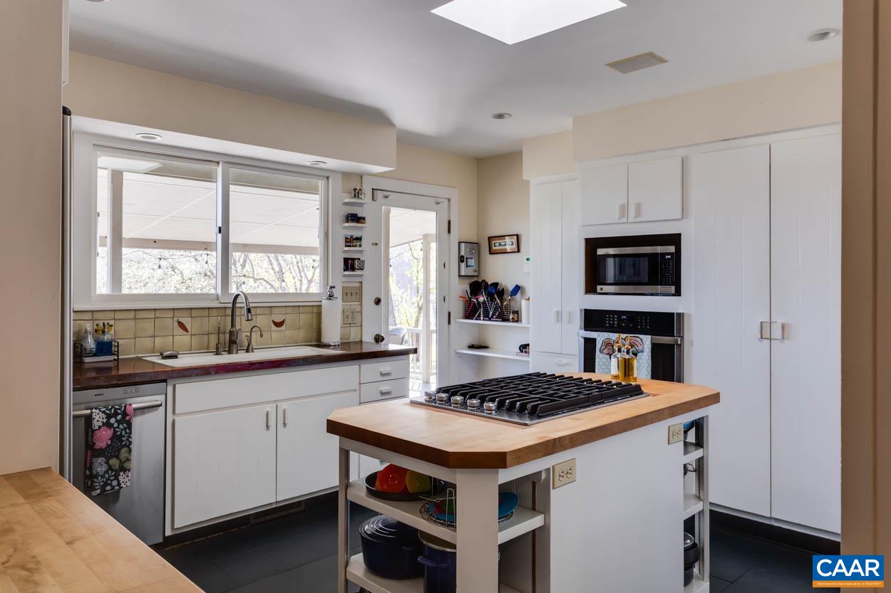 361 Union Mills Road Troy, VA 22974 - Photo 65 of 75 a kitchen with a sink stove and cabinets