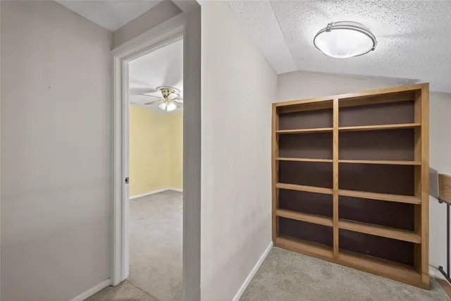 a view of a room with shelves