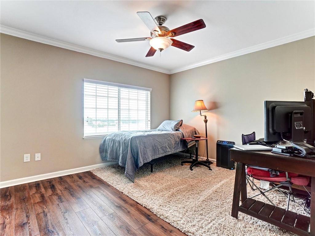 3435 Kingsboro Road Northeast, Unit 1601 Atlanta, GA 30326 - Photo 27 of 54 a bedroom with bed and a window