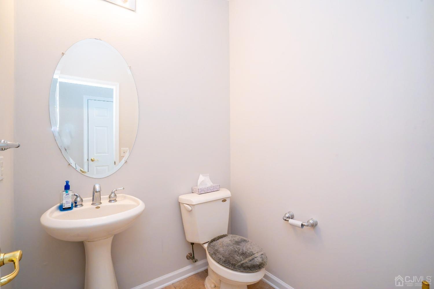 7 Stony Path Dayton, NJ 08810 - Photo 23 of 33 a bathroom with a toilet sink and mirror