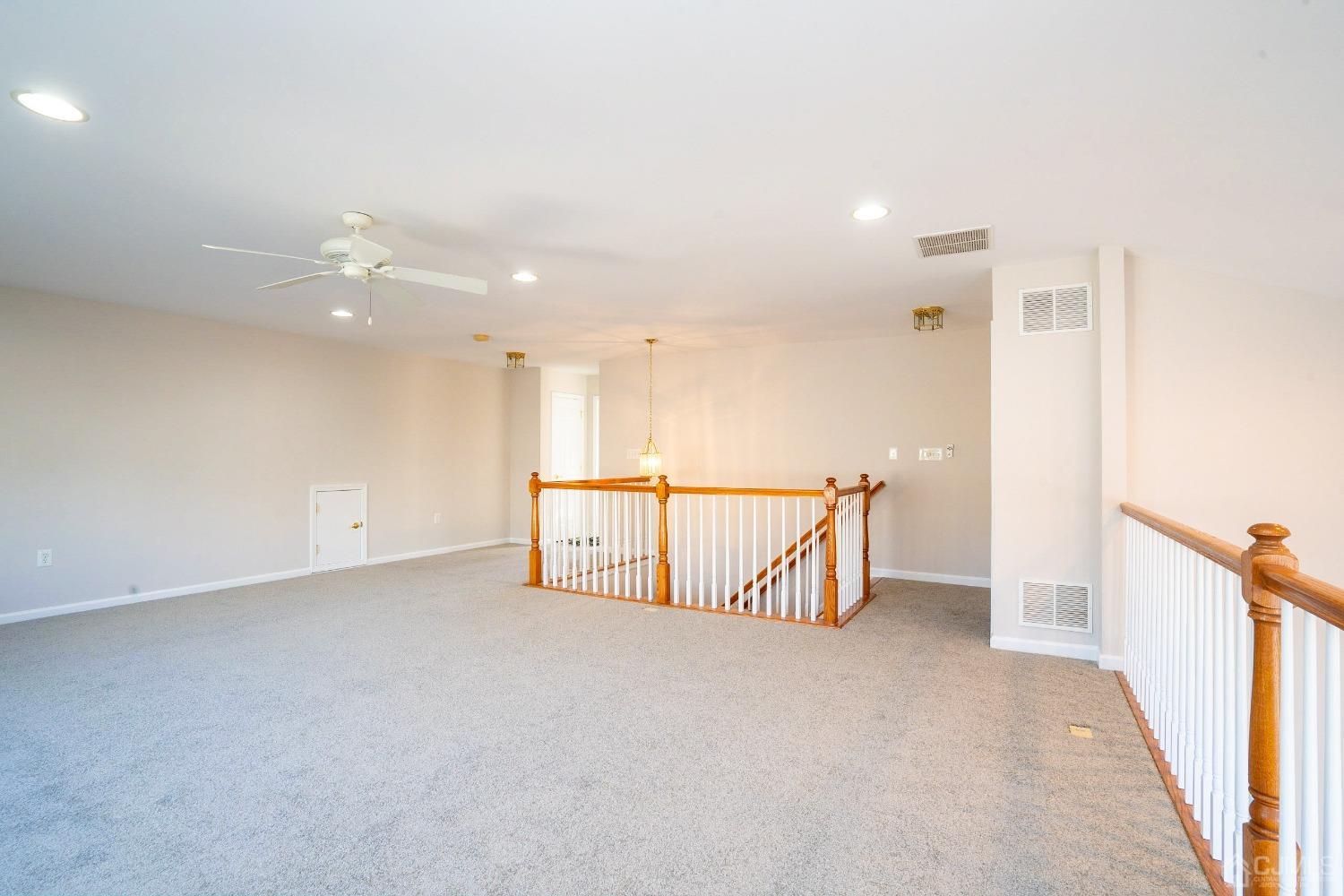 7 Stony Path Dayton, NJ 08810 - Photo 26 of 33 a view of a hall with a ceiling fan