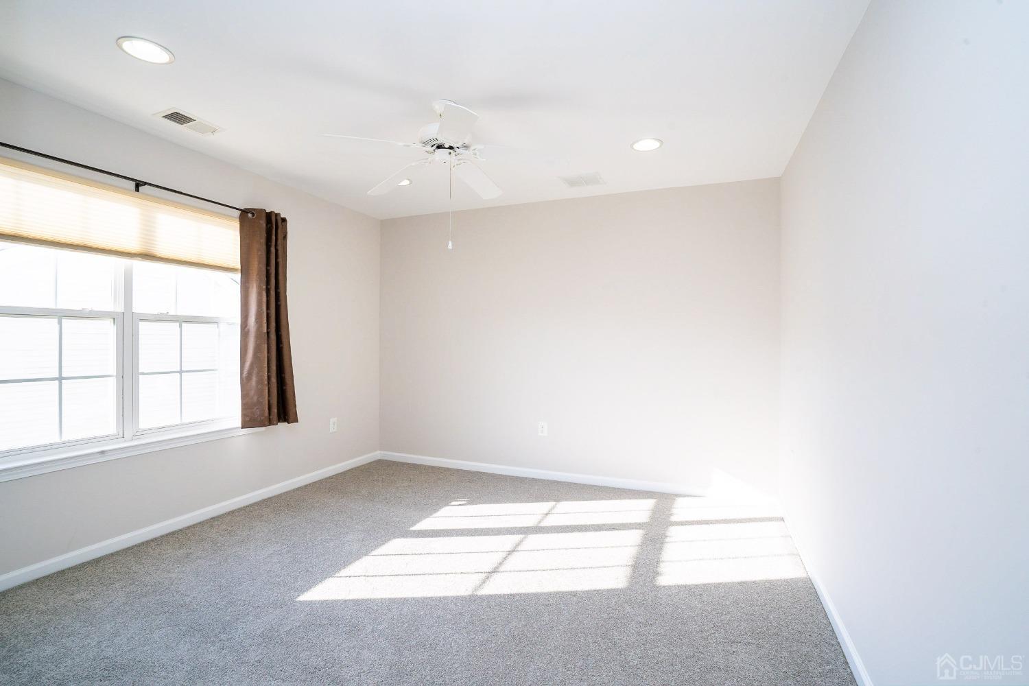 7 Stony Path Dayton, NJ 08810 - Photo 28 of 33 an empty room with a window