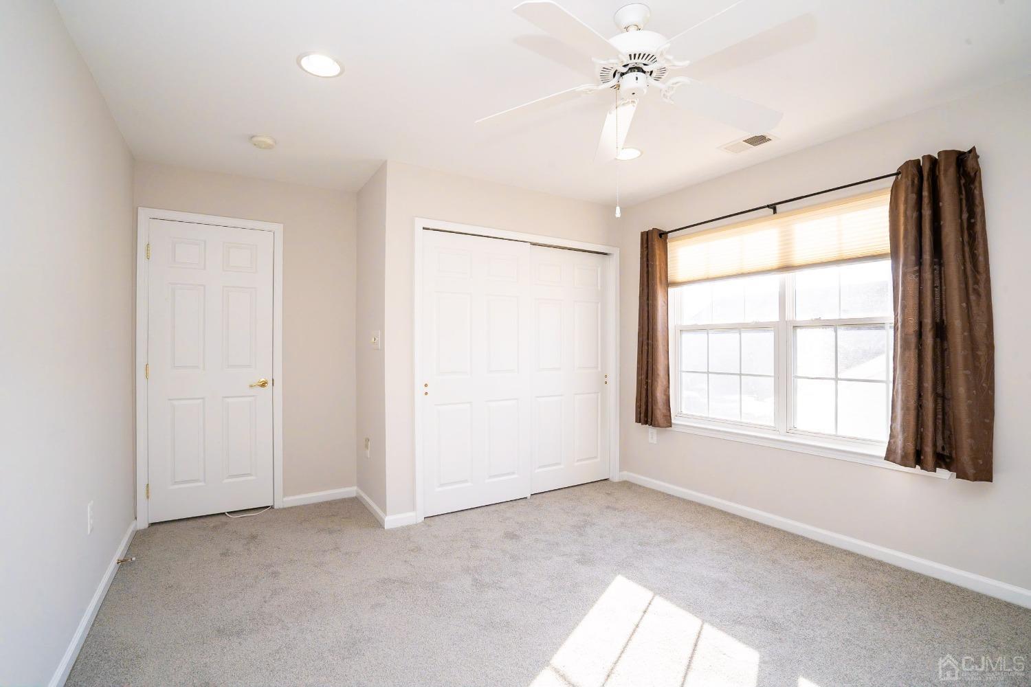 7 Stony Path Dayton, NJ 08810 - Photo 29 of 33 a view of an empty room with a window