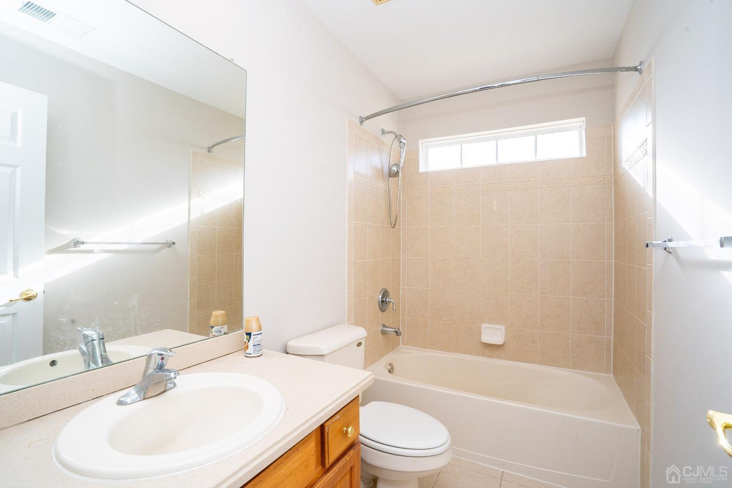 7 Stony Path Dayton, NJ 08810 - Photo 30 of 33 a bathroom with a sink toilet and shower