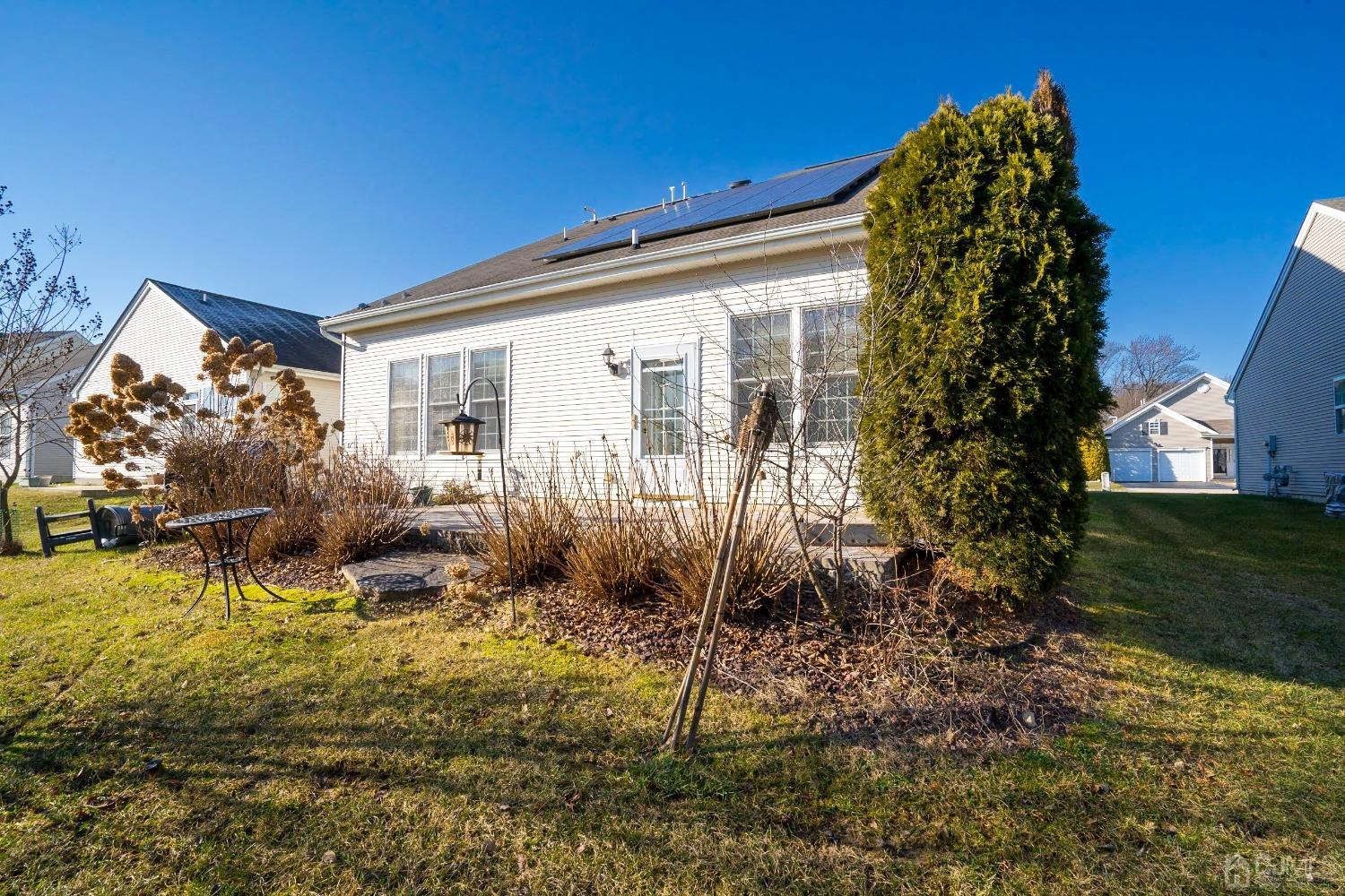 7 Stony Path Dayton, NJ 08810 - Photo 32 of 33 a view of a house with backyard and sitting area