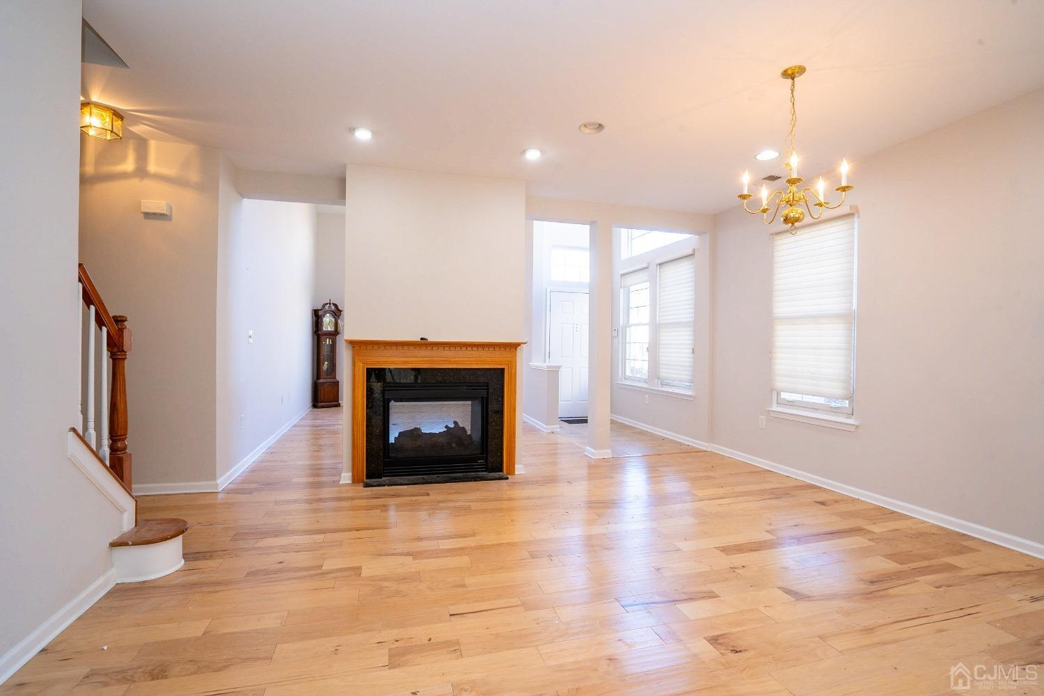 7 Stony Path Dayton, NJ 08810 - Photo 8 of 33 a view of an empty room with window and fire place