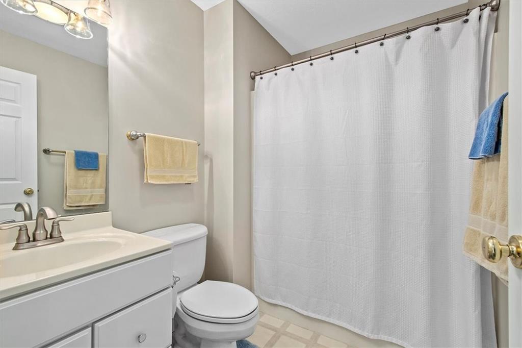 386 Pine Ridge Drive Venetia, PA 15367 - Photo 18 of 25 a bathroom with a sink a toilet and shower