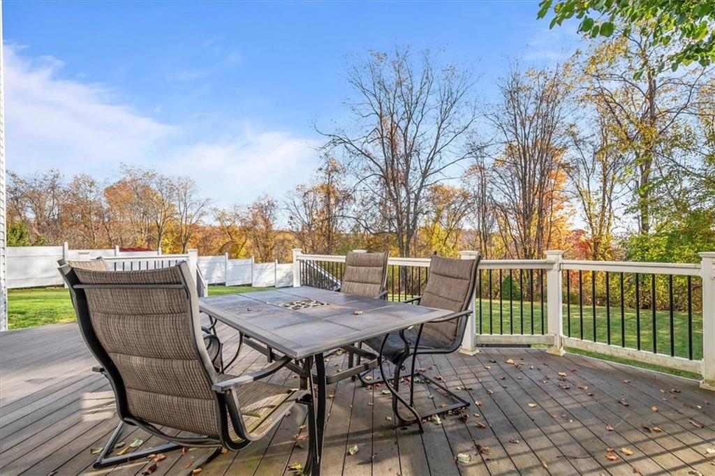 386 Pine Ridge Drive Venetia, PA 15367 - Photo 22 of 25 a view of a chairs and table on the deck