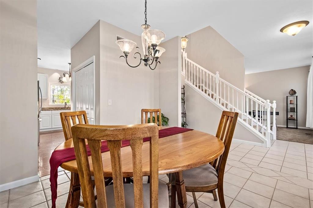 386 Pine Ridge Drive Venetia, PA 15367 - Photo 4 of 25 a view of a dining room with furniture and wooden floor