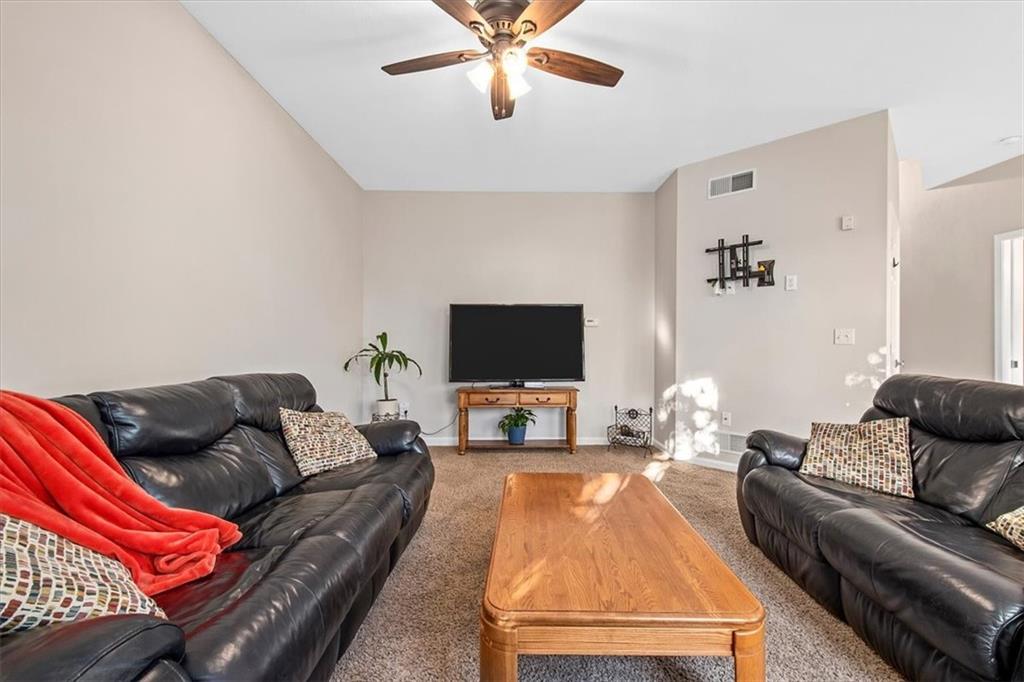 386 Pine Ridge Drive Venetia, PA 15367 - Photo 8 of 25 a living room with furniture and a flat screen tv