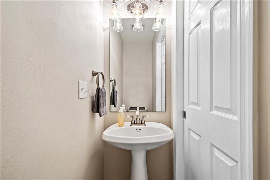 386 Pine Ridge Drive Venetia, PA 15367 - Photo 10 of 25 a bathroom with a sink and a mirror