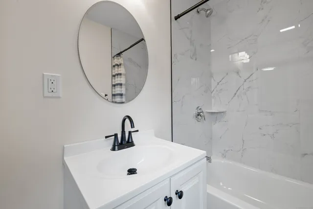 a view of a deck with a table and chairs