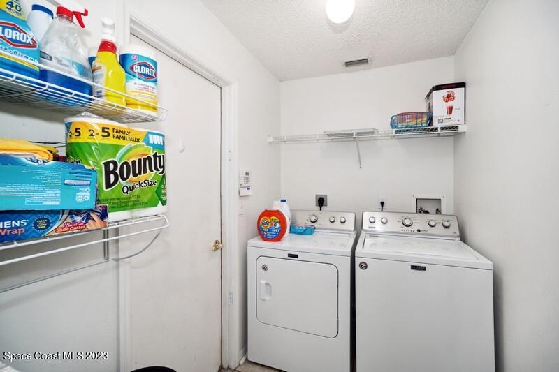 1102 Sunday Drive Rockledge, FL 32955 - Photo 11 of 16 a utility room with dryer and washer