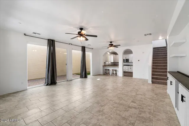 a view of a livingroom with a flat screen tv and fireplace
