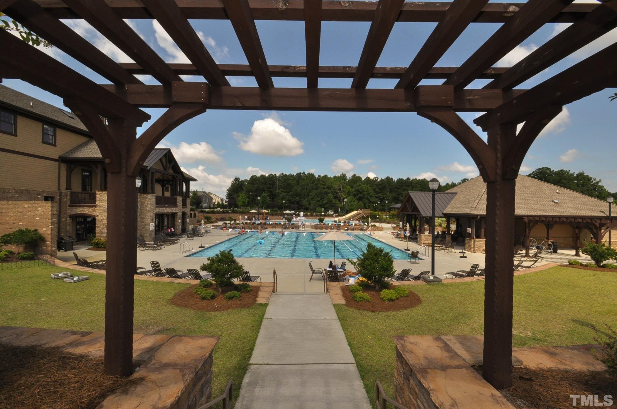4104 Burnaby Street Raleigh, NC 27616 - Photo 41 of 59 a view of swimming pool with seating area