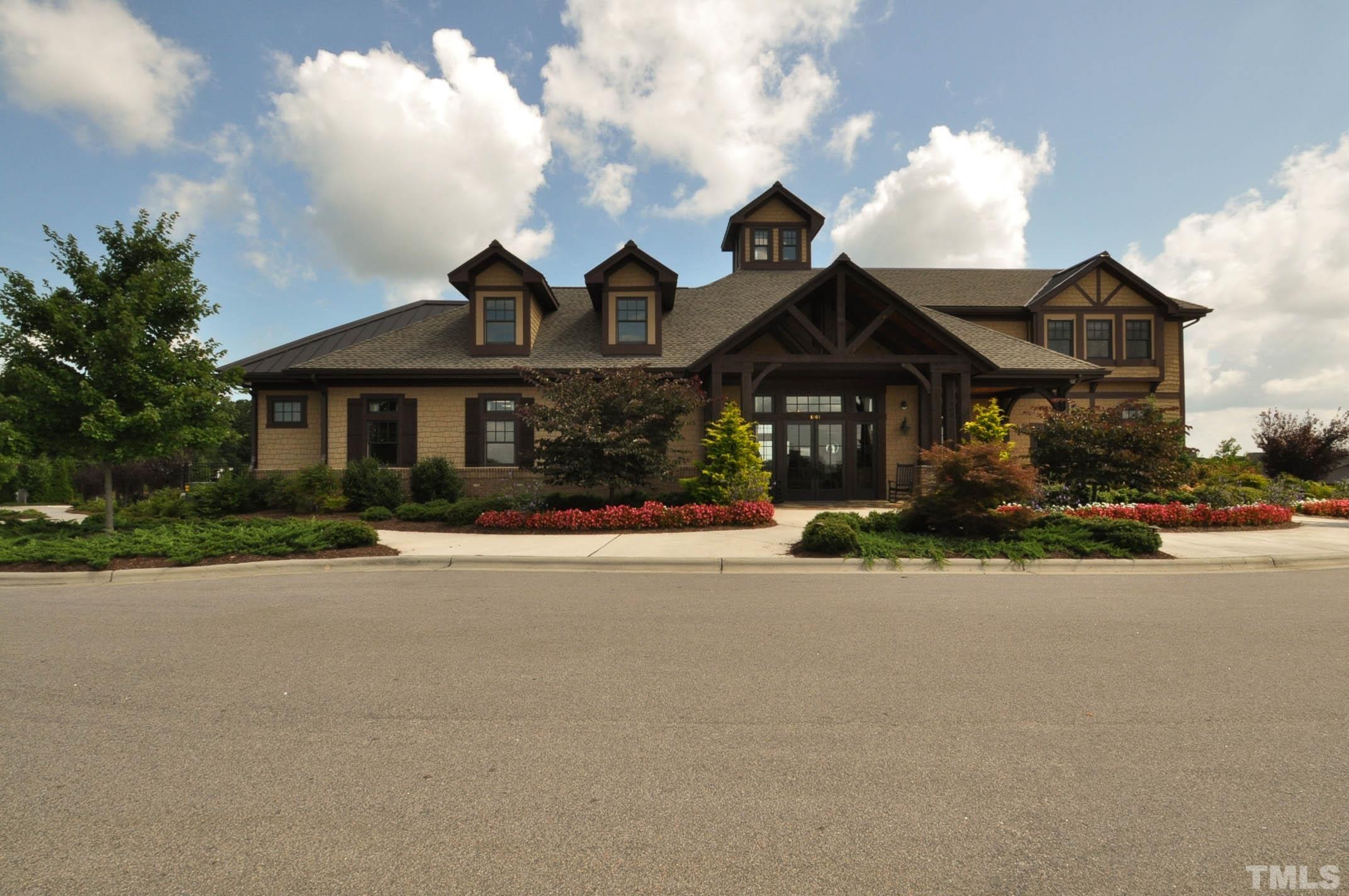 4104 Burnaby Street Raleigh, NC 27616 - Photo 43 of 59 a front view of a house with a yard