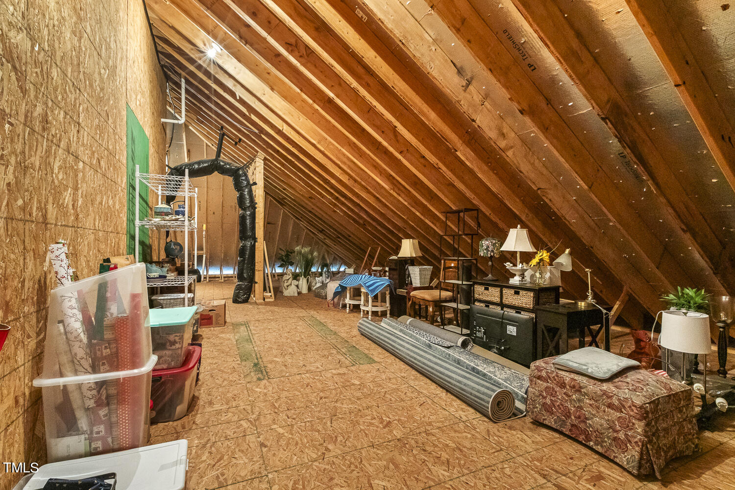 7105 Carries Reach Way Raleigh, NC 27614 - Photo 20 of 24 The other of the TWO HUGE walk in attic areas that could easily be finished!