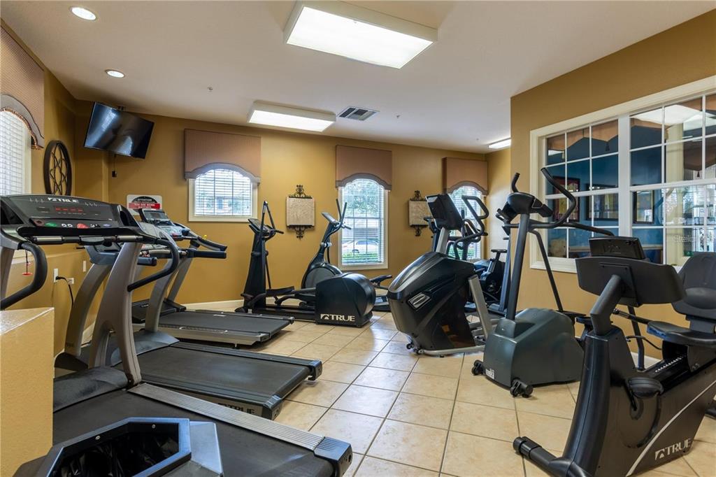 3611 Conroy Road, Unit 834 Orlando, FL 32839 - Photo 21 of 22 a view of a room with gym equipment