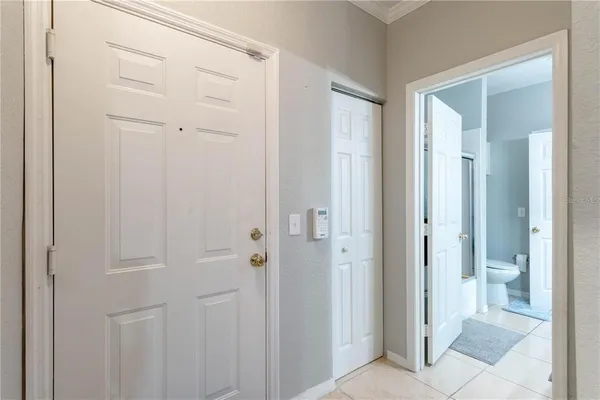 a view of a bathroom from a hallway