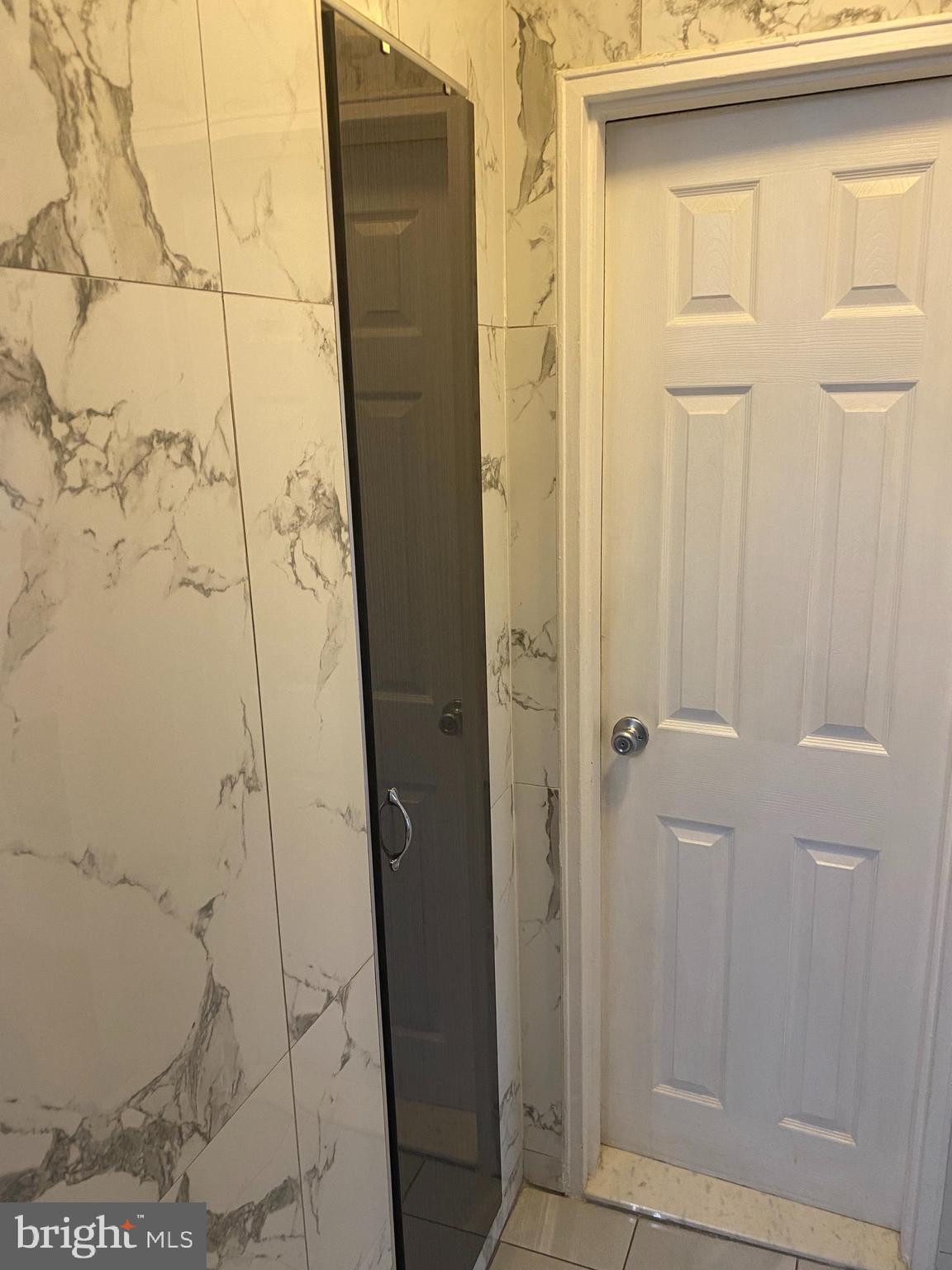 2101 Chestnut Street, Unit 519 Philadelphia, PA 19103 - Photo 6 of 21 a bathroom with a shower