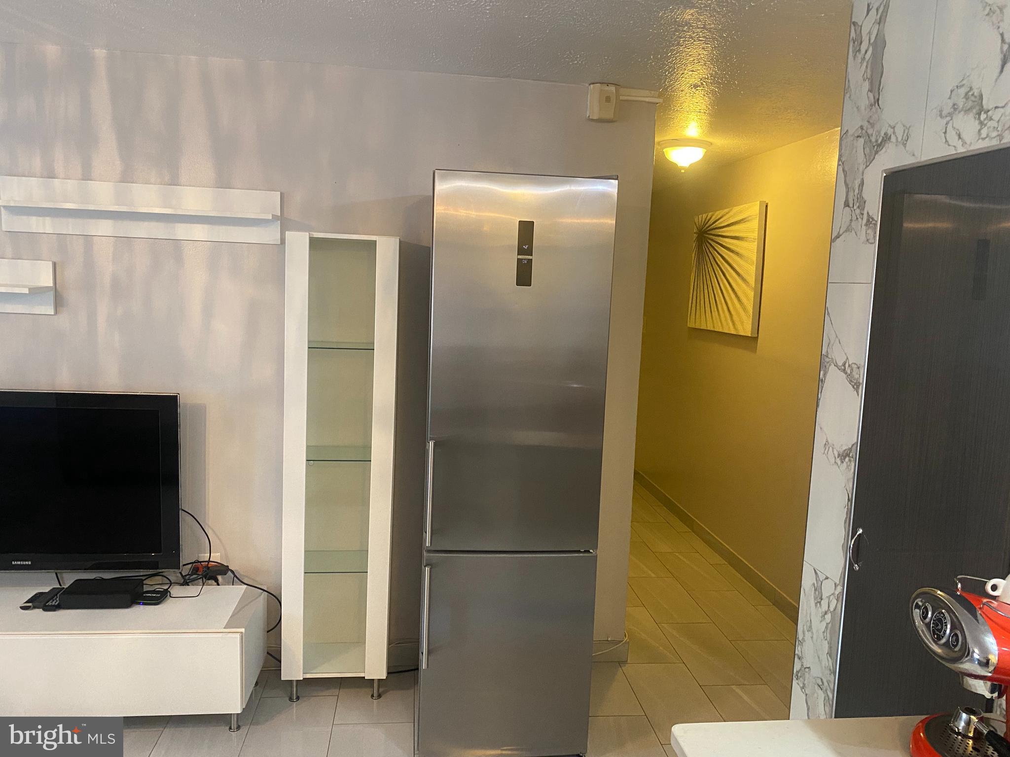 2101 Chestnut Street, Unit 519 Philadelphia, PA 19103 - Photo 8 of 21 a bathroom with a shower and a sink