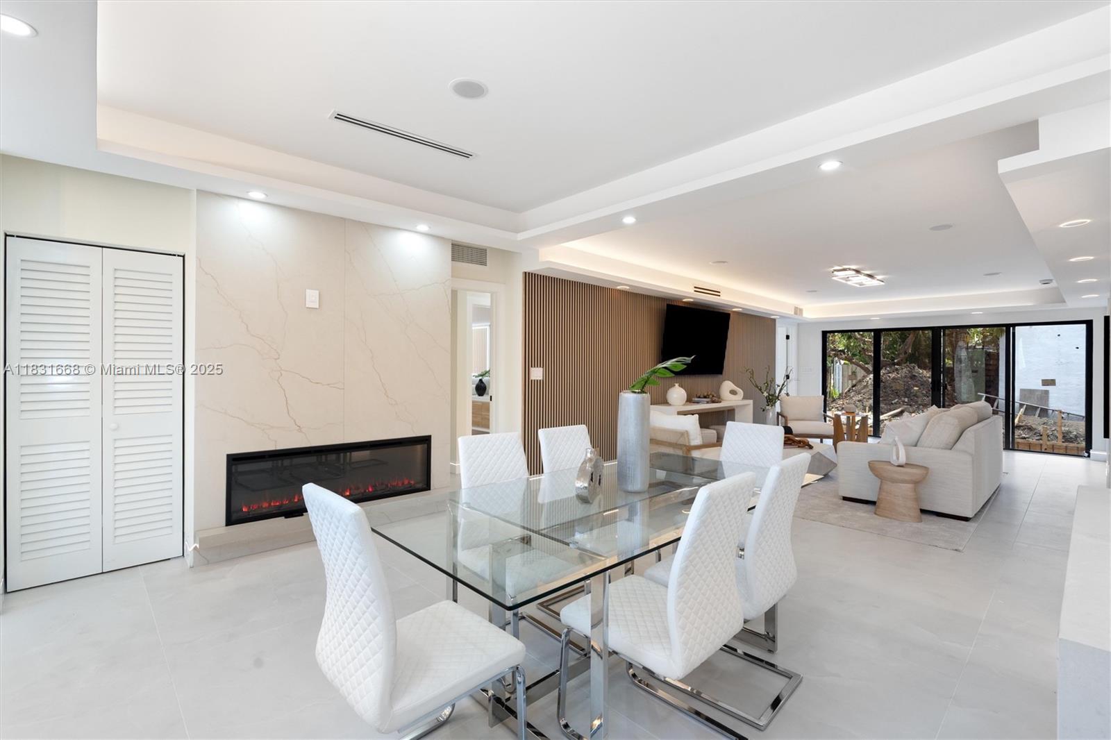 1108 Harrison Street Hollywood, FL 33019 - Photo 7 of 19 a dining room with furniture and wooden floor