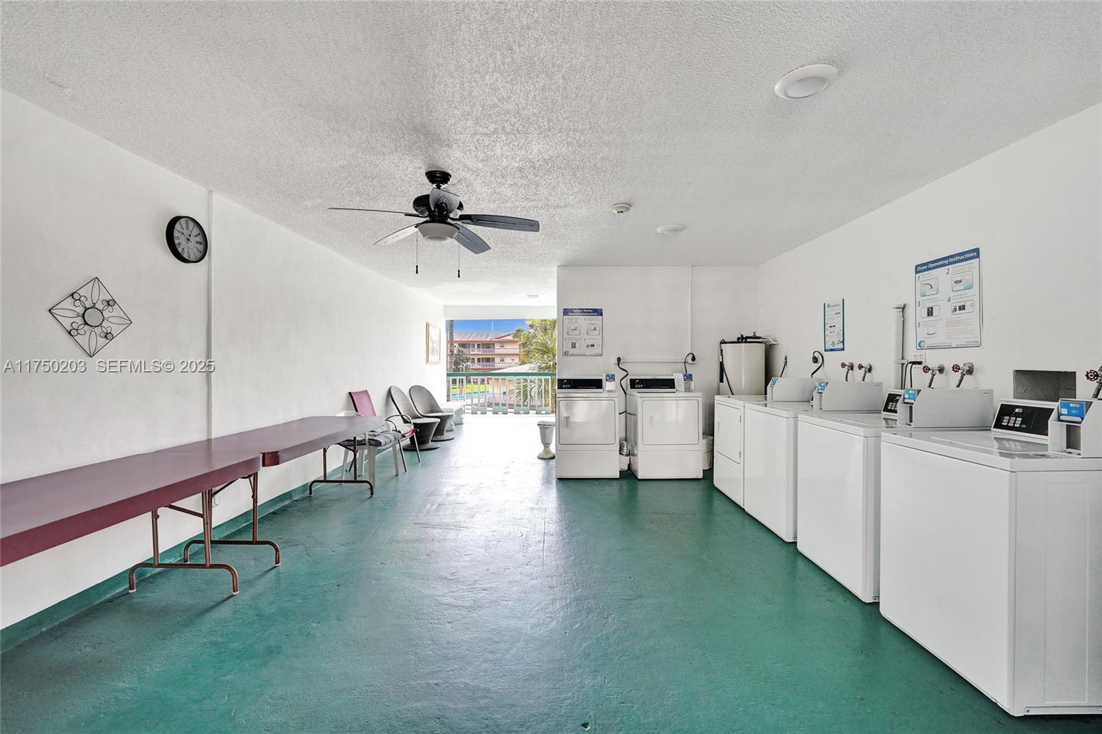 5300 Washington Street, Unit I203 Hollywood, FL 33021 - Photo 48 of 75 a living room with furniture and a large window