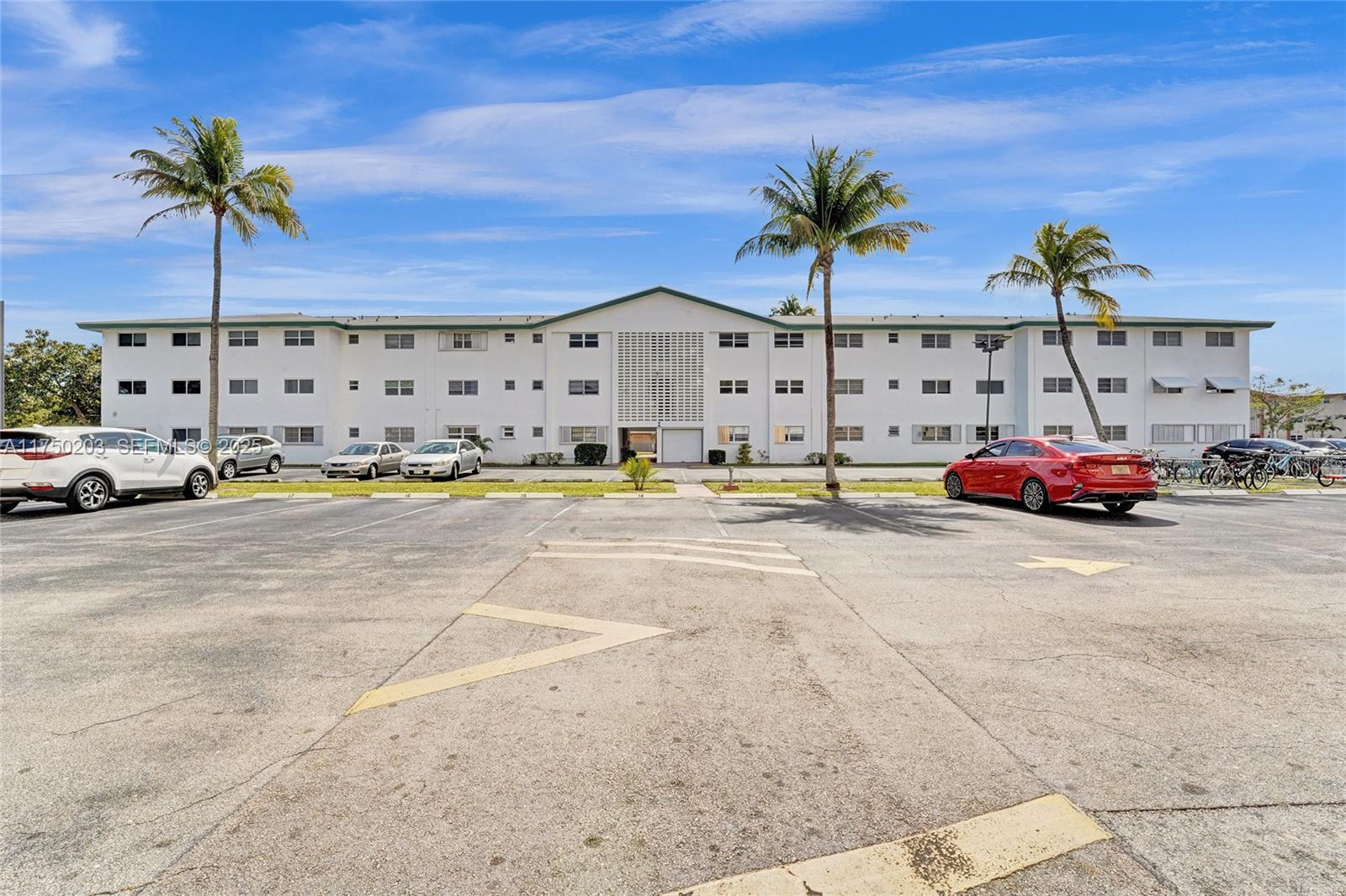5300 Washington Street, Unit I203 Hollywood, FL 33021 - Photo 70 of 75 a car parked on the side of the road