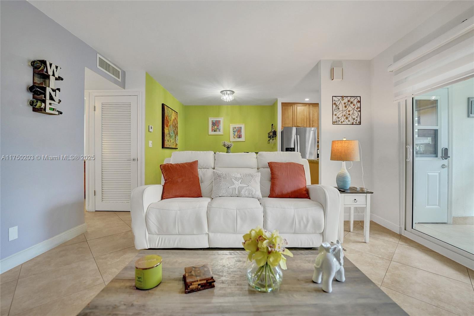 5300 Washington Street, Unit I203 Hollywood, FL 33021 - Photo 8 of 75 a living room with furniture and wooden floor