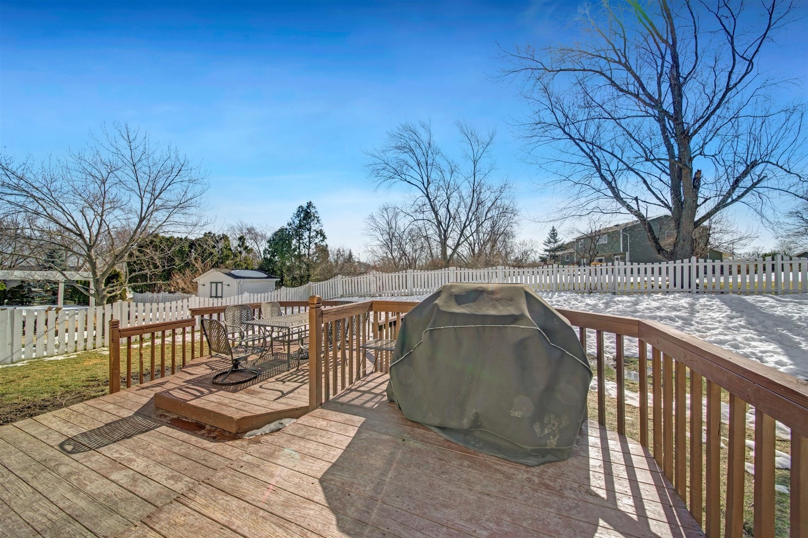 146 Sumac Lane Schaumburg, IL 60193 - Photo 17 of 24 a view of deck with two chairs and wooden fence