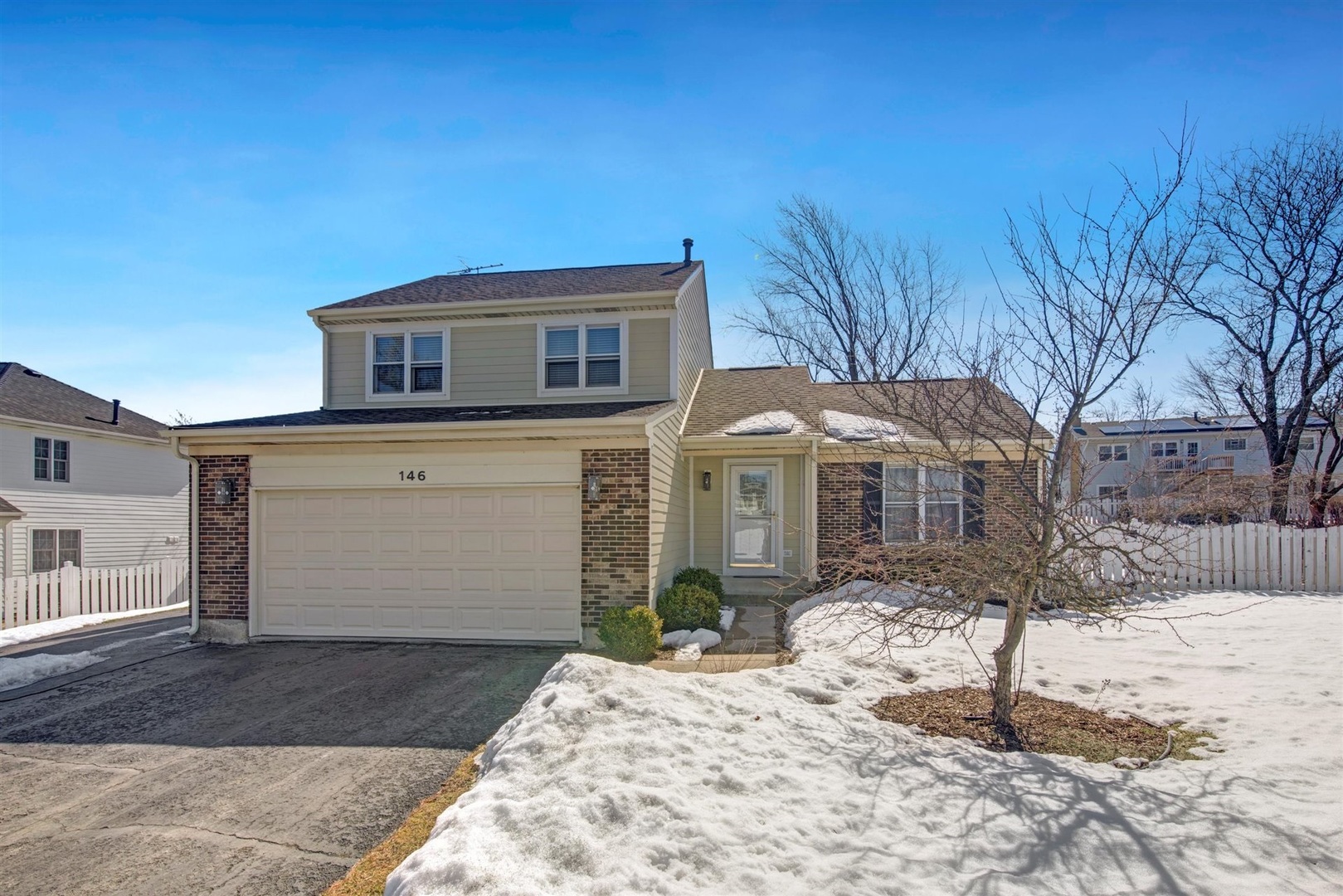 146 Sumac Lane Schaumburg, IL 60193 - Photo 24 of 24 a front view of a house with a yard