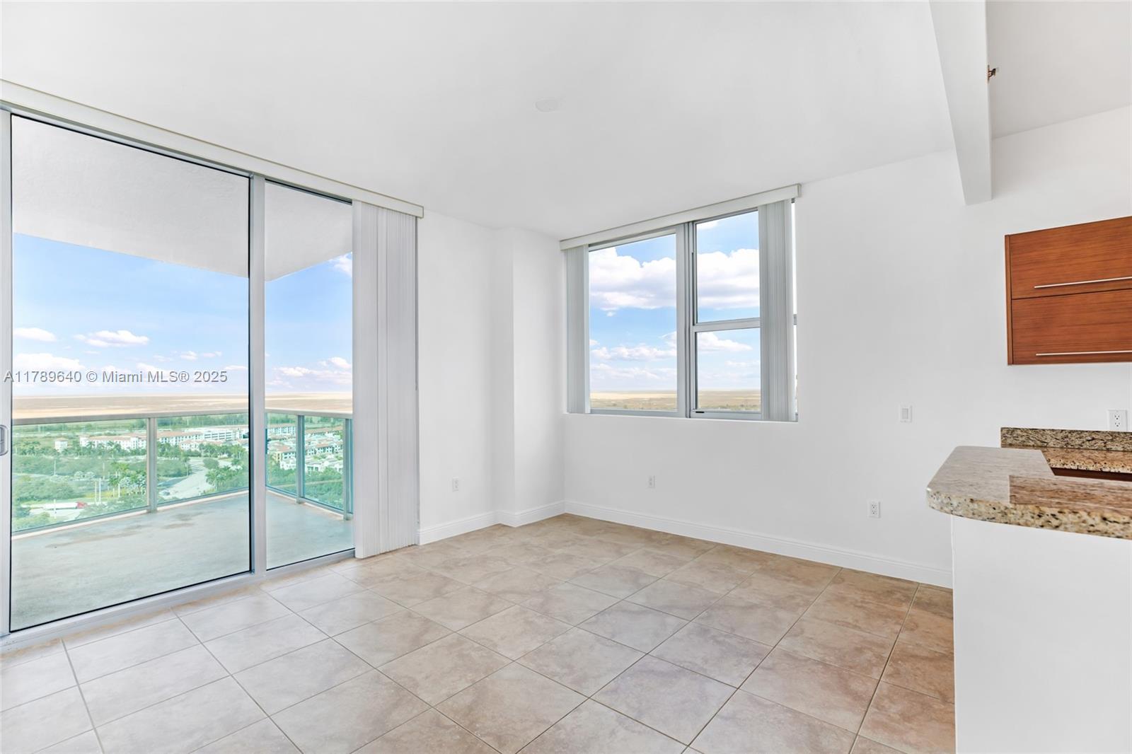 2641 North Flamingo Road, Unit 2608N Sunrise, FL 33323 - Photo 4 of 15 a view of an empty room with a window