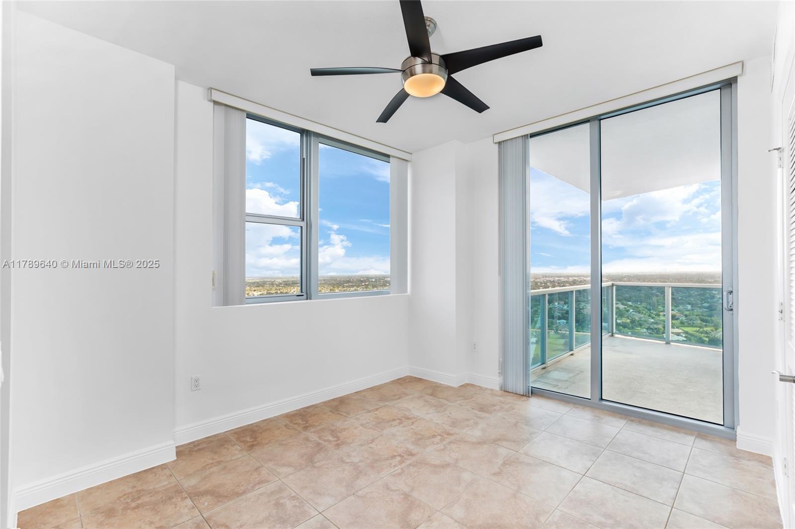 2641 North Flamingo Road, Unit 2608N Sunrise, FL 33323 - Photo 6 of 15 a view of an empty room with a window