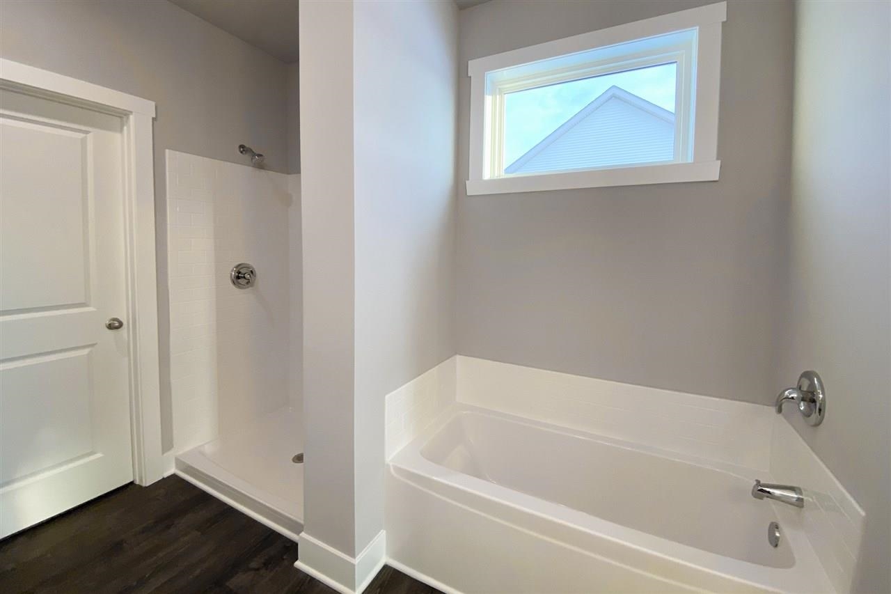 2510 Court Ridge Road Belvidere, IL 61008 - Photo 16 of 22 a white bath tub sitting next to a window