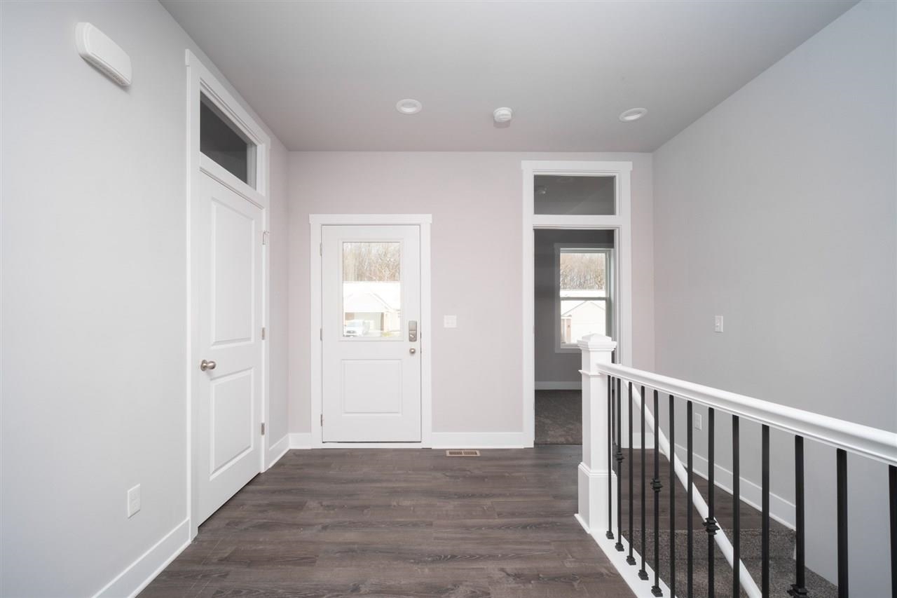 2510 Court Ridge Road Belvidere, IL 61008 - Photo 3 of 22 a view of a hallway with wooden floor and entryway