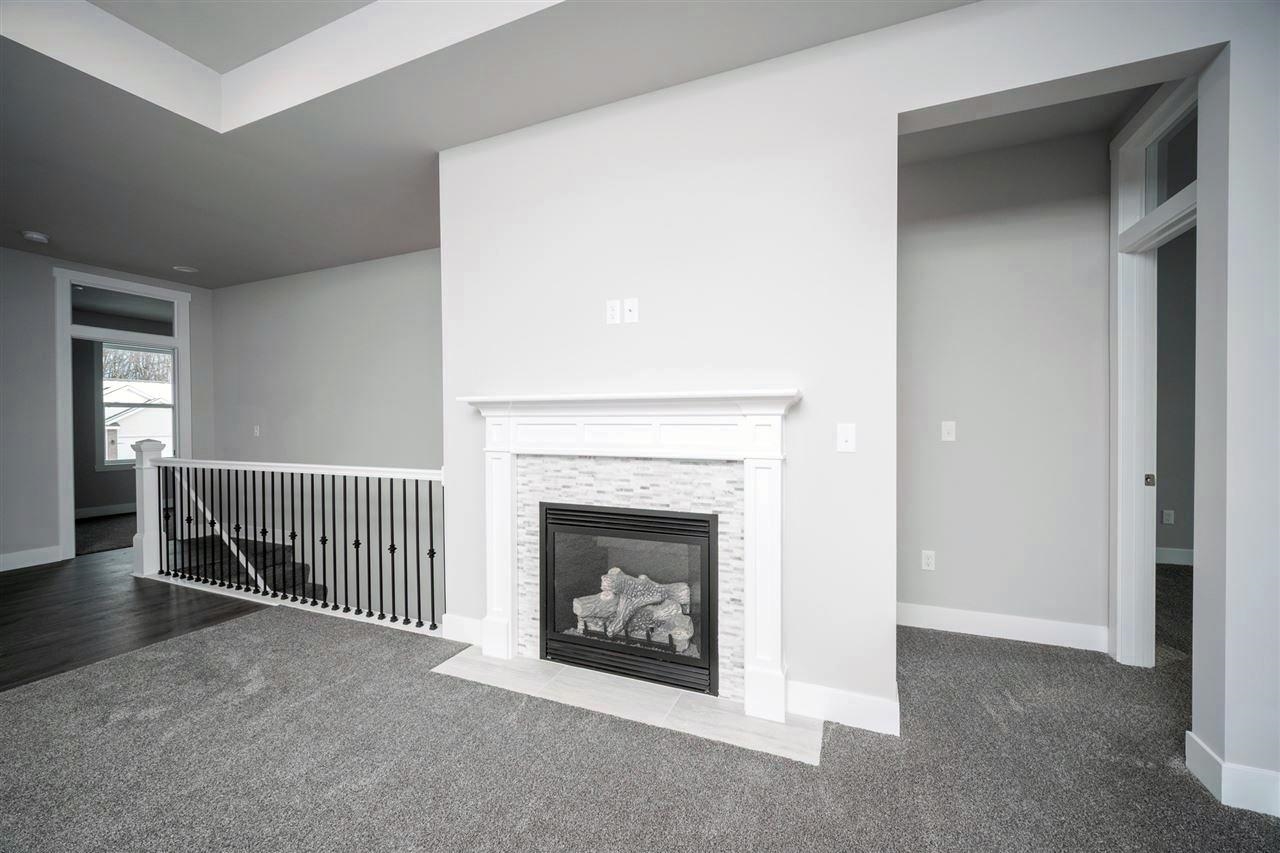 2510 Court Ridge Road Belvidere, IL 61008 - Photo 8 of 22 a view of a livingroom with a fireplace and a window