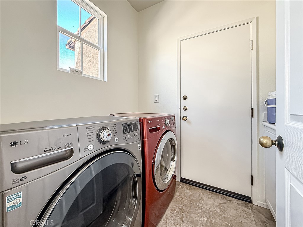 5244 Via Rincon Newbury Park, CA 91320 - Photo 12 of 19 a utility room with dryer and washer