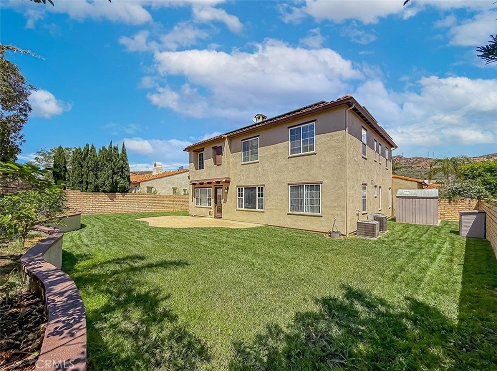 5244 Via Rincon Newbury Park, CA 91320 - Photo 15 of 19 a view of a house with a big yard