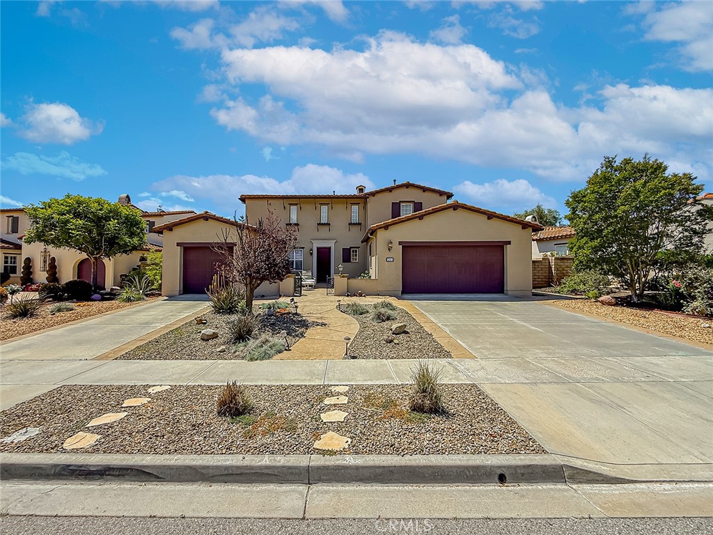5244 Via Rincon Newbury Park, CA 91320 - Photo 4 of 19 a front view of a house with garden